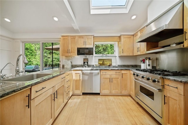 20 Wagner Rd, Westerly, RI 02891 - kitchen with stainless steel appliances, ventilation hood, light brown cabinets, light wood-type flooring, and recessed lighting
