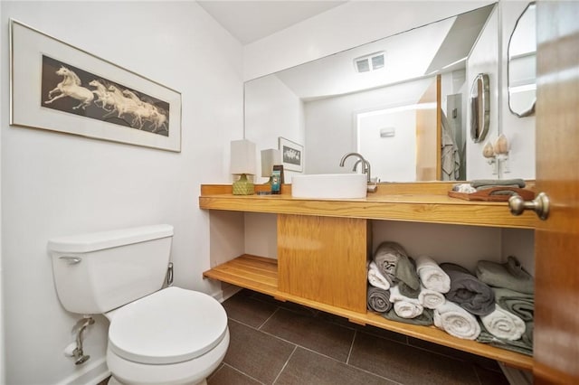 20 Wagner Rd, Westerly, RI 02891 - half bathroom featuring toilet and tile patterned flooring