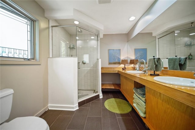 20 Wagner Rd, Westerly, RI 02891 - bathroom with double vanity, a shower stall, tile patterned flooring, and recessed lighting