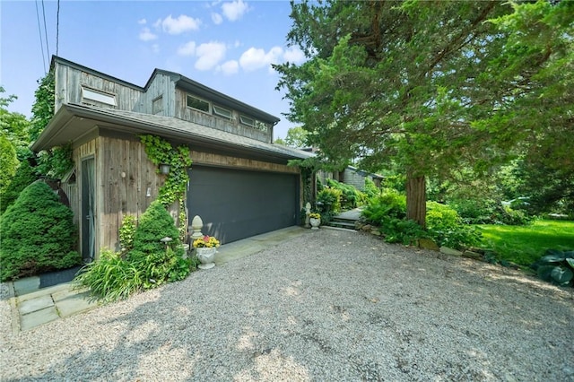20 Wagner Rd, Westerly, RI 02891 - view of property exterior with driveway and an attached garage