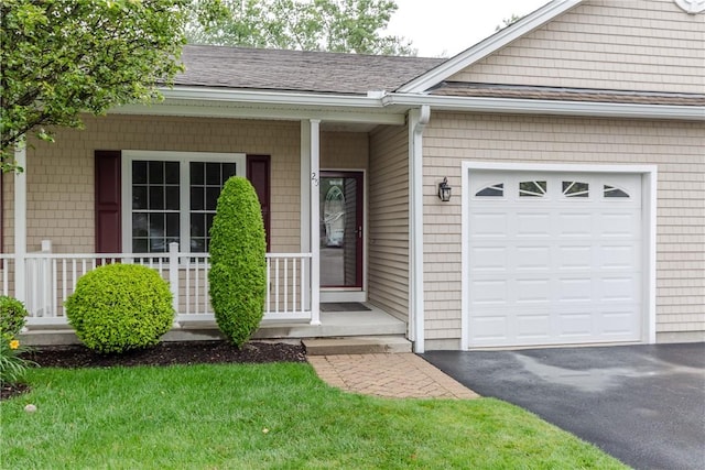 1285 Hartford Ave Unit 25, Johnston, RI 02919 - view of front of home with a shingled roof, an attached garage, and covered porch