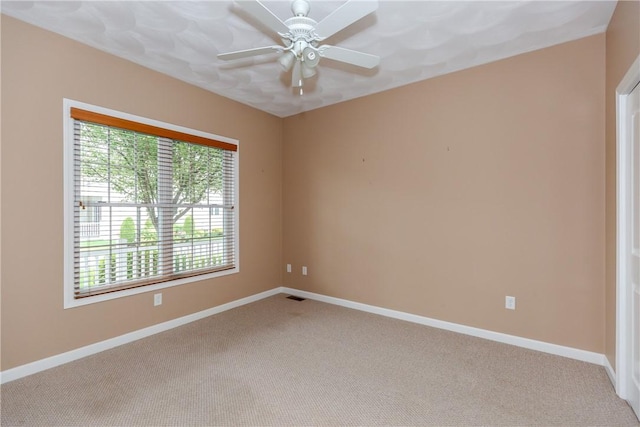 1285 Hartford Ave Unit 25, Johnston, RI 02919 - spare room featuring healthy amount of natural light, light colored carpet, and a ceiling fan