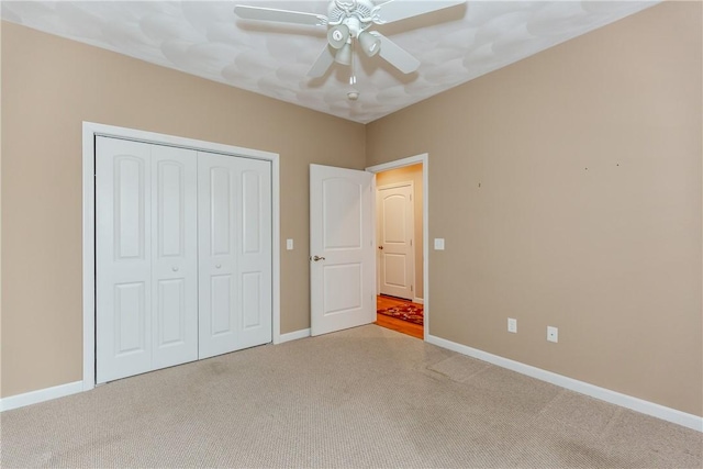 1285 Hartford Ave Unit 25, Johnston, RI 02919 - unfurnished bedroom with carpet floors, a closet, and ceiling fan
