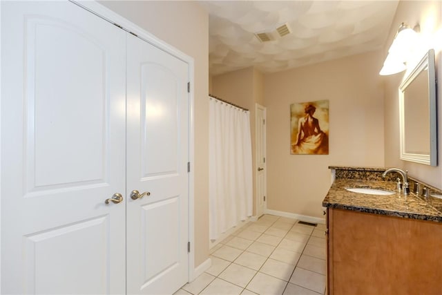 1285 Hartford Ave Unit 25, Johnston, RI 02919 - bathroom featuring vanity, tile patterned flooring, and a shower with curtain