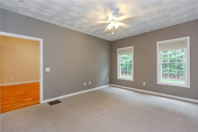 1285 Hartford Ave Unit 25, Johnston, RI 02919 - carpeted empty room with baseboards and ceiling fan