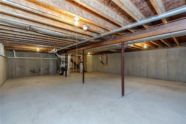 1285 Hartford Ave Unit 25, Johnston, RI 02919 - unfinished basement featuring gas water heater and electric panel
