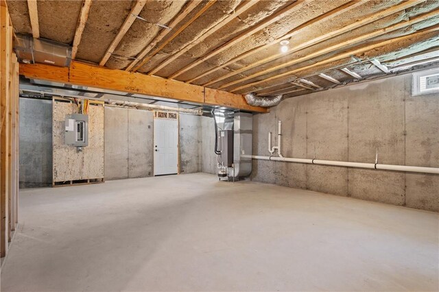 52 Governor St, Cumberland, RI 02864 - unfinished basement with electric panel and heating unit
