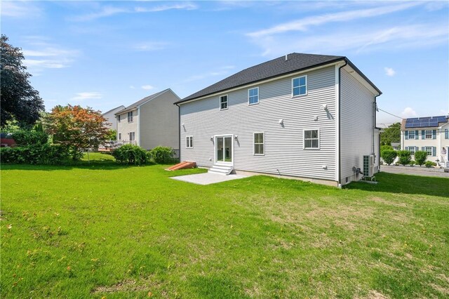 52 Governor St, Cumberland, RI 02864 - back of house featuring entry steps and a yard