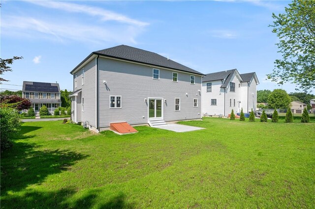 52 Governor St, Cumberland, RI 02864 - back of property with a yard and entry steps