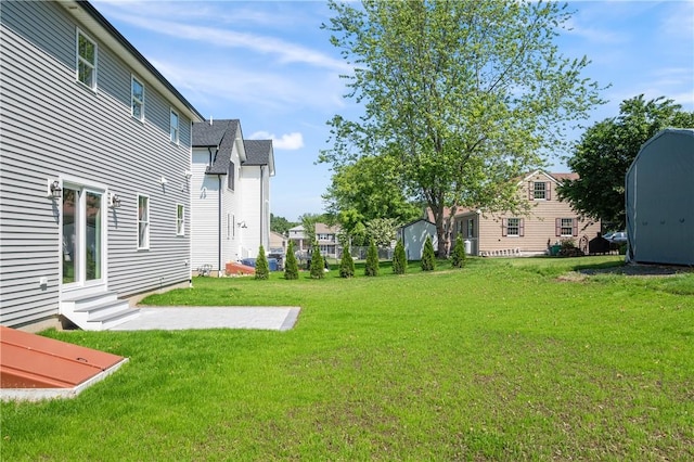 52 Governor St, Cumberland, RI 02864 - view of grassy yard with a residential view, a patio area, and entry steps
