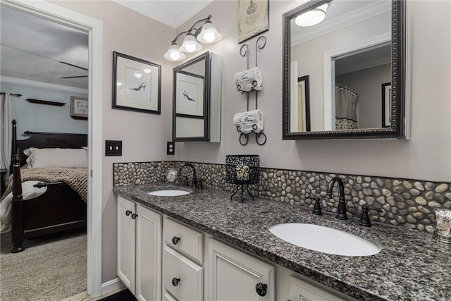 88 Red Brook Ln Unit 88, West Warwick, RI 02893 - ensuite bathroom with double vanity, ornamental molding, and tasteful backsplash