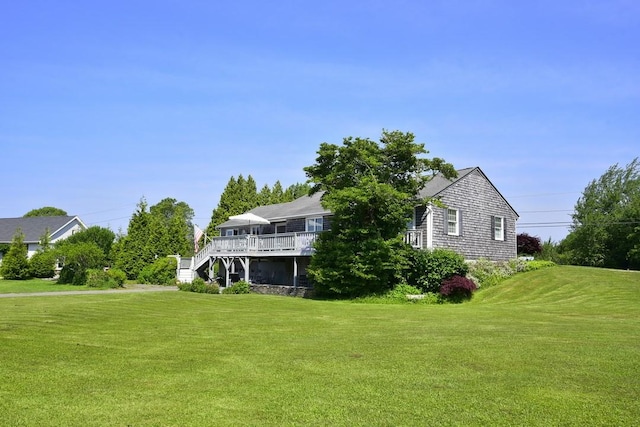 1 Butts Rock Rd, Little Compton, RI 02837 - view of property exterior featuring a lawn, a deck, and stairway
