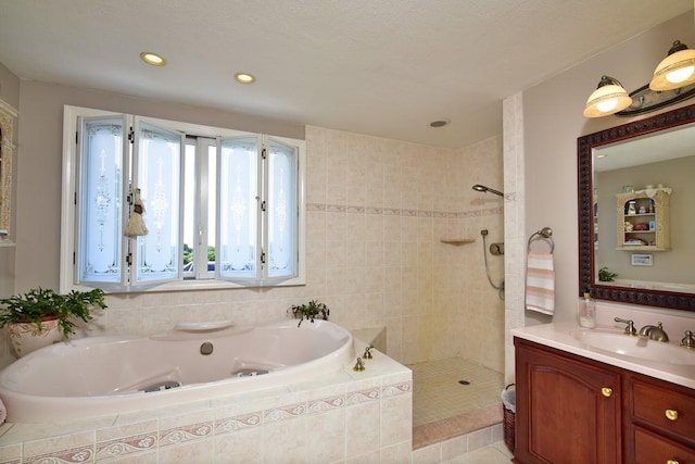 1 Butts Rock Rd, Little Compton, RI 02837 - full bathroom featuring a whirlpool tub, vanity, tiled shower, and recessed lighting