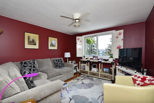 1 Butts Rock Rd, Little Compton, RI 02837 - living room with ceiling fan, wood finished floors, and a textured ceiling