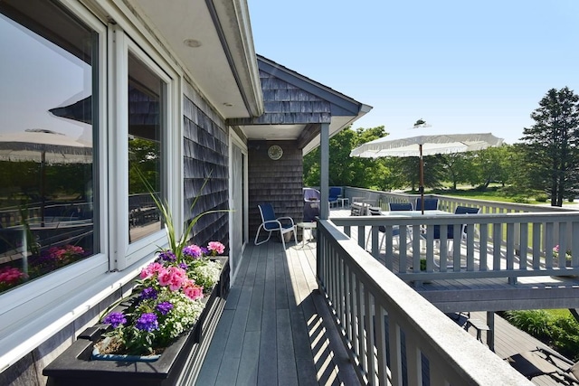 1 Butts Rock Rd, Little Compton, RI 02837 - wooden deck with outdoor dining space