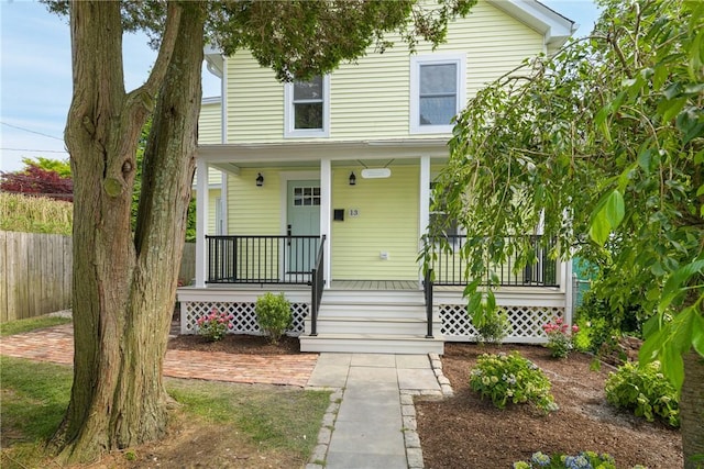 13 Carey St, Newport, RI 02840 - view of front facade featuring a porch
