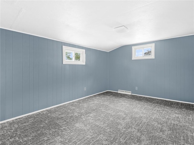 25 Martha Rd, East Providence, RI 02916 - unfurnished room featuring carpet floors and lofted ceiling