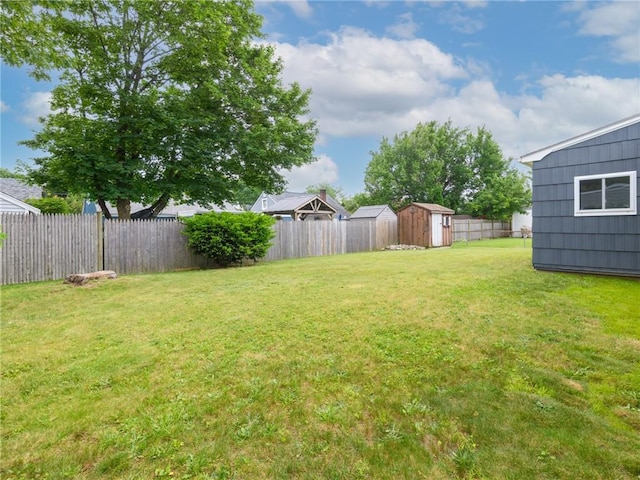 25 Martha Rd, East Providence, RI 02916 - fenced backyard featuring a storage shed