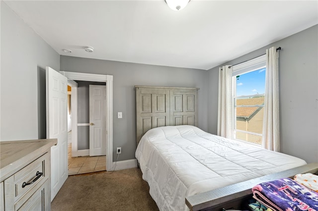 313 Branch Ave, Providence, RI 02904 - bedroom with light colored carpet and light tile patterned flooring