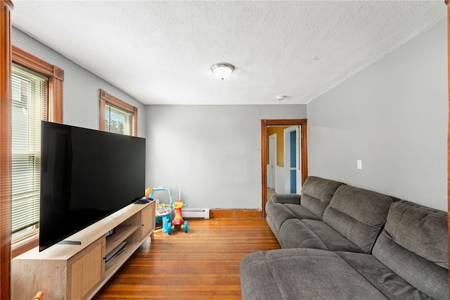 313 Branch Ave, Providence, RI 02904 - living area with wood finished floors and a textured ceiling
