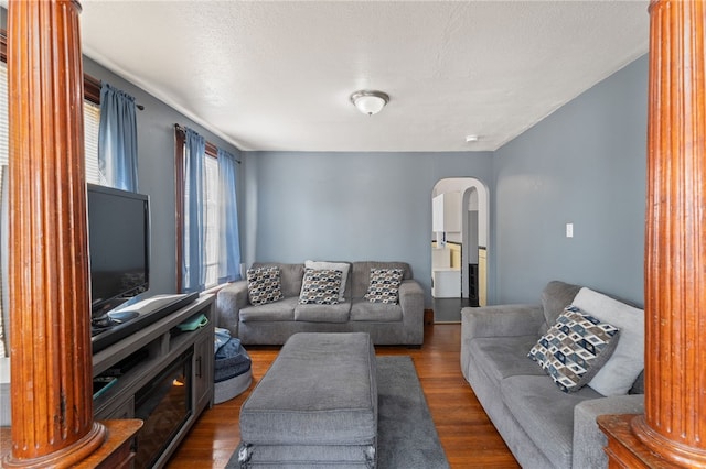313 Branch Ave, Providence, RI 02904 - living area with arched walkways and wood finished floors