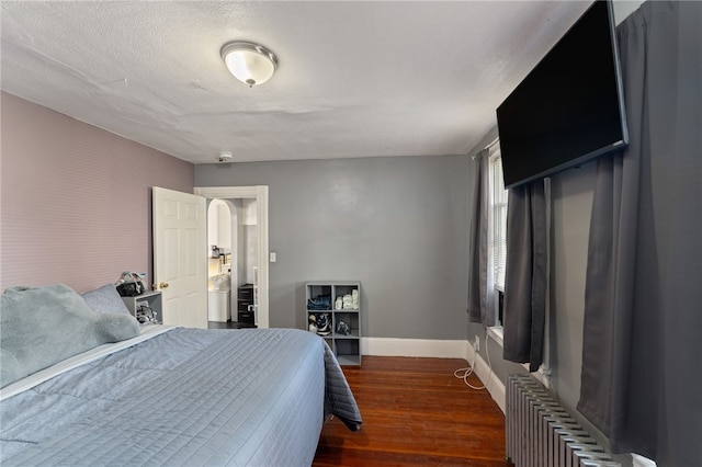 313 Branch Ave, Providence, RI 02904 - bedroom featuring dark wood-style floors and arched walkways
