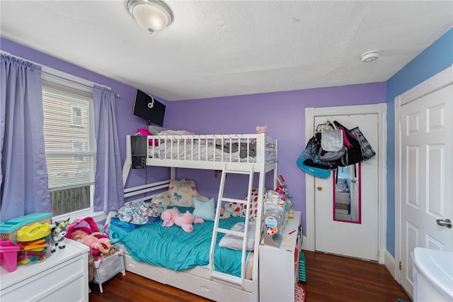 313 Branch Ave, Providence, RI 02904 - bedroom featuring wood finished floors and a textured ceiling