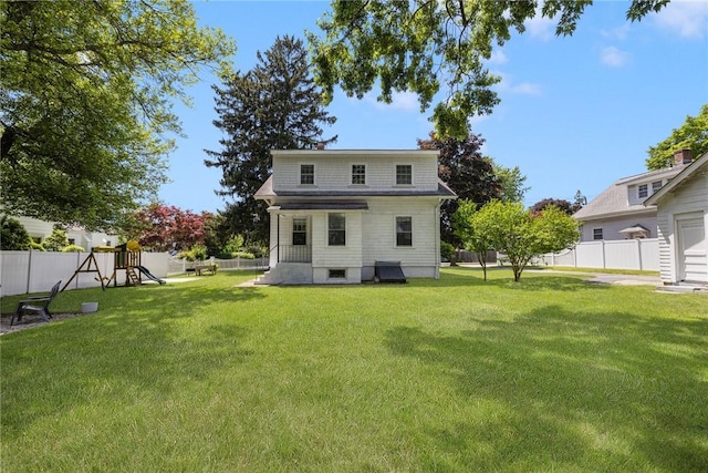 110 Spofford Ave, Warwick, RI 02888 - back of property with a fenced backyard and a playground
