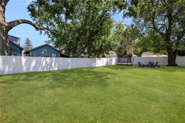110 Spofford Ave, Warwick, RI 02888 - fenced backyard featuring a trampoline