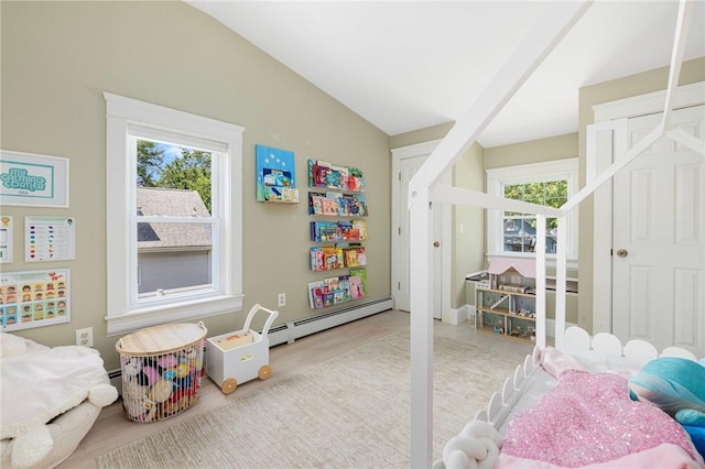 110 Spofford Ave, Warwick, RI 02888 - bedroom with a baseboard radiator and wood finished floors