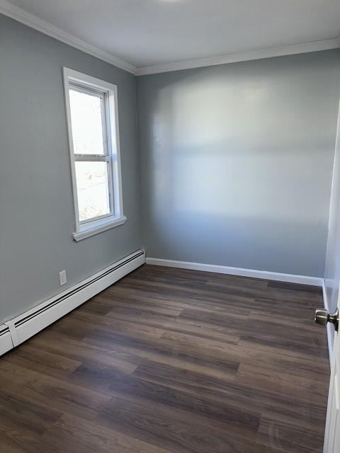 25 School St, West Warwick, RI 02893 - empty room featuring baseboard heating, ornamental molding, and dark wood finished floors