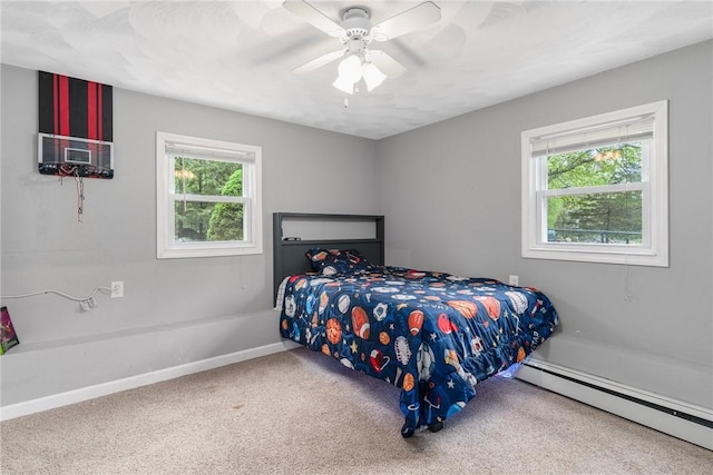 350 Shippee Rd, East Greenwich, RI 02818 - bedroom featuring a baseboard radiator, multiple windows, carpet flooring, and a ceiling fan