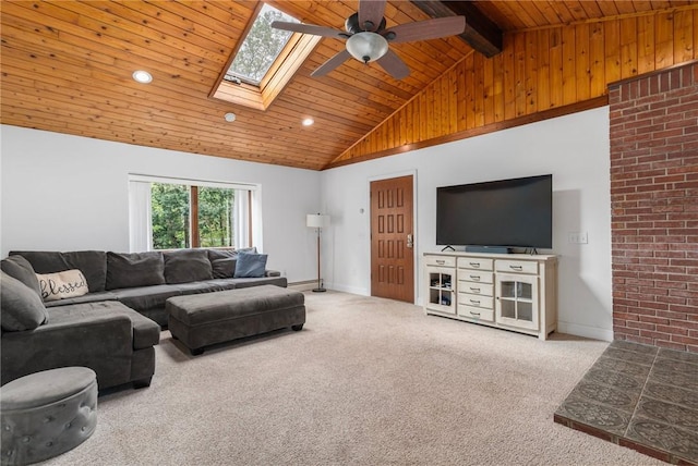 350 Shippee Rd, East Greenwich, RI 02818 - carpeted living room featuring ceiling fan, a wooden ceiling with exposed beams, a skylight, recessed lighting, and high vaulted ceiling