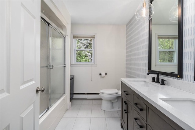 350 Shippee Rd, East Greenwich, RI 02818 - full bath with tile patterned floors, baseboard heating, double vanity, and healthy amount of natural light