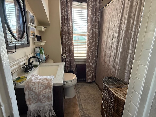 68 Grove St, Providence, RI 02909 - bathroom featuring vanity and toilet