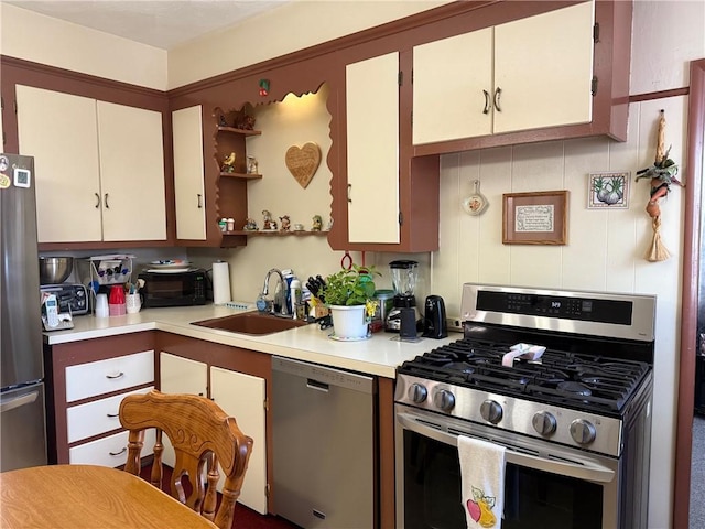 68 Grove St, Providence, RI 02909 - kitchen with stainless steel appliances, light countertops, and open shelves