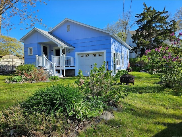 19 Lindberg Rd, Stonington, CT 06378 - ranch-style house featuring a garage and a front lawn