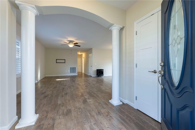 109 Chickadee Ln, South Kingstown, RI 02879 - entryway featuring ornate columns, ceiling fan, and wood finished floors