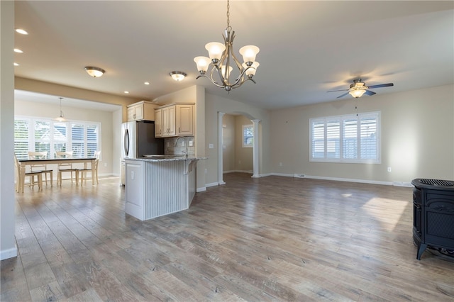 109 Chickadee Ln, South Kingstown, RI 02879 - kitchen with arched walkways, ceiling fan, open floor plan, plenty of natural light, and recessed lighting