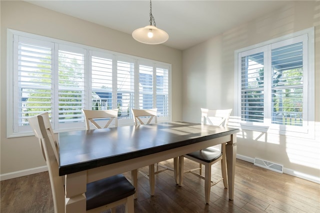 109 Chickadee Ln, South Kingstown, RI 02879 - dining area featuring wood finished floors and healthy amount of natural light