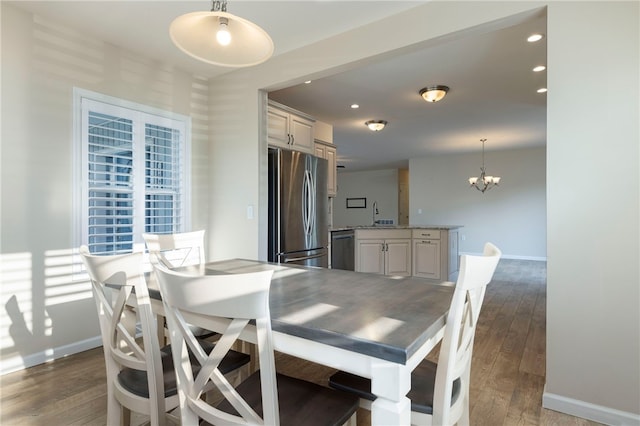 109 Chickadee Ln, South Kingstown, RI 02879 - dining area featuring a chandelier, dark wood-style flooring, and recessed lighting