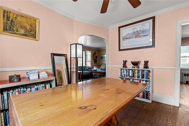 41 Higgins Ave, Providence, RI 02908 - home office featuring arched walkways, dark wood-type flooring, ceiling fan, crown molding, and radiator heating unit
