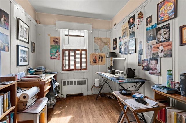 41 Higgins Ave, Providence, RI 02908 - office area with radiator heating unit and wood finished floors