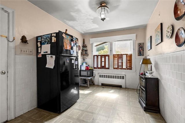 41 Higgins Ave, Providence, RI 02908 - interior space featuring radiator, a wainscoted wall, and tile walls