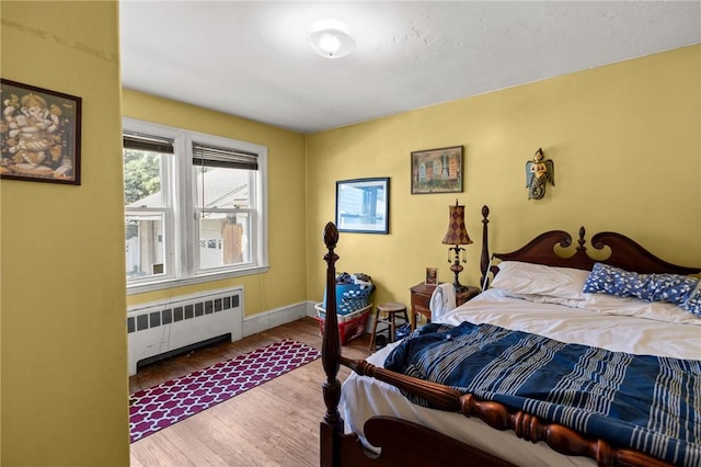 41 Higgins Ave, Providence, RI 02908 - bedroom with radiator and wood finished floors
