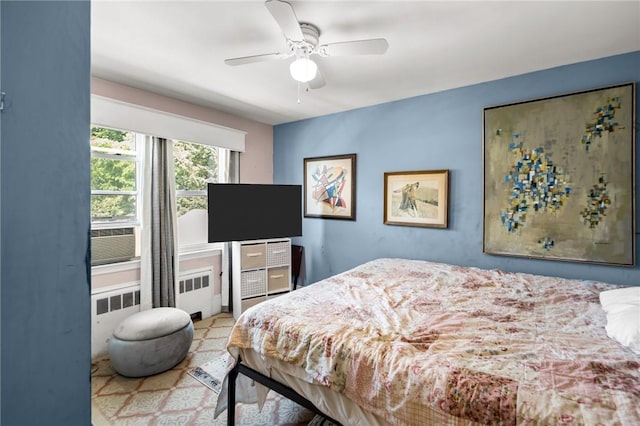 41 Higgins Ave, Providence, RI 02908 - bedroom with cooling unit, a ceiling fan, and radiator
