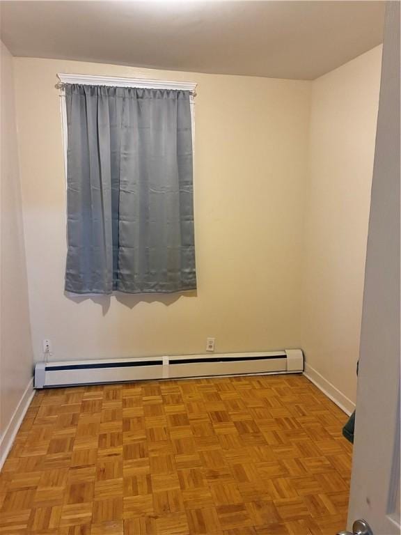 121 Murray St, Providence, RI 02909 - unfurnished room featuring baseboards and a baseboard heating unit