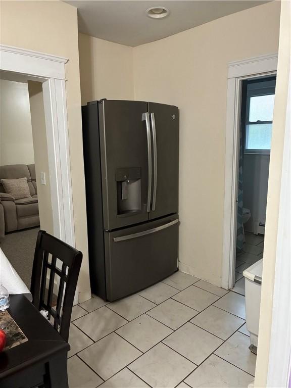 121 Murray St, Providence, RI 02909 - kitchen with refrigerator with ice dispenser and light tile patterned floors