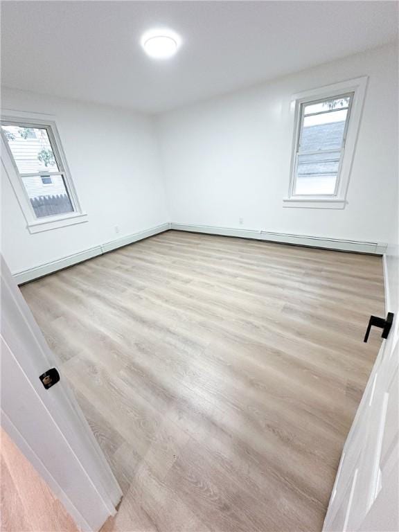 9 Octavia St, Providence, RI 02909 - unfurnished room with wood finished floors and healthy amount of natural light