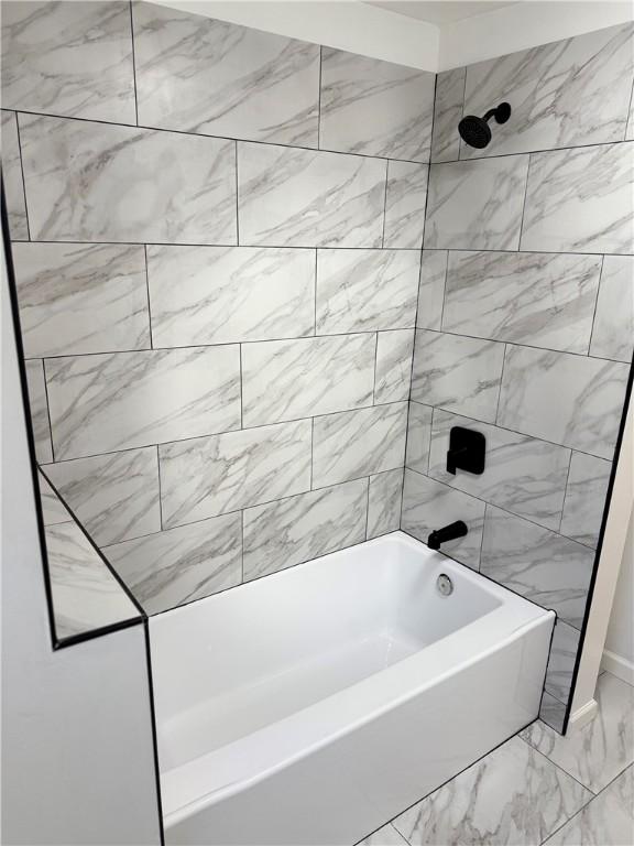 9 Octavia St, Providence, RI 02909 - bathroom with  shower combination and marble look tiles